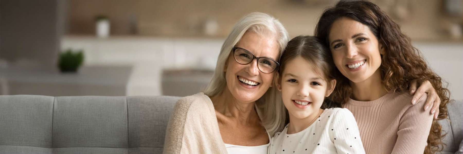mother, duaghter, and grandmother smiling 