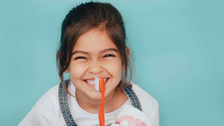 Smiling Child in Dental Chair in Barrie