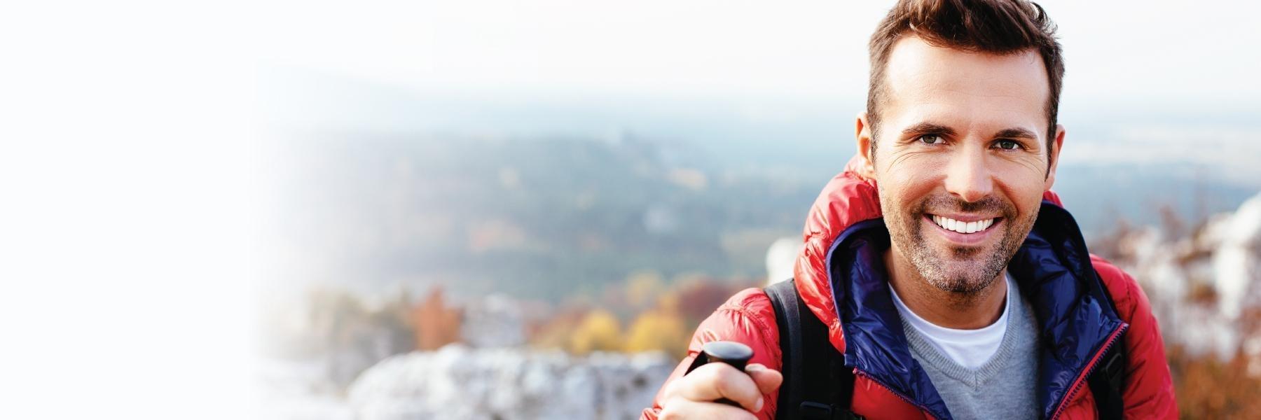 Barrie Man in red jacket smiling 