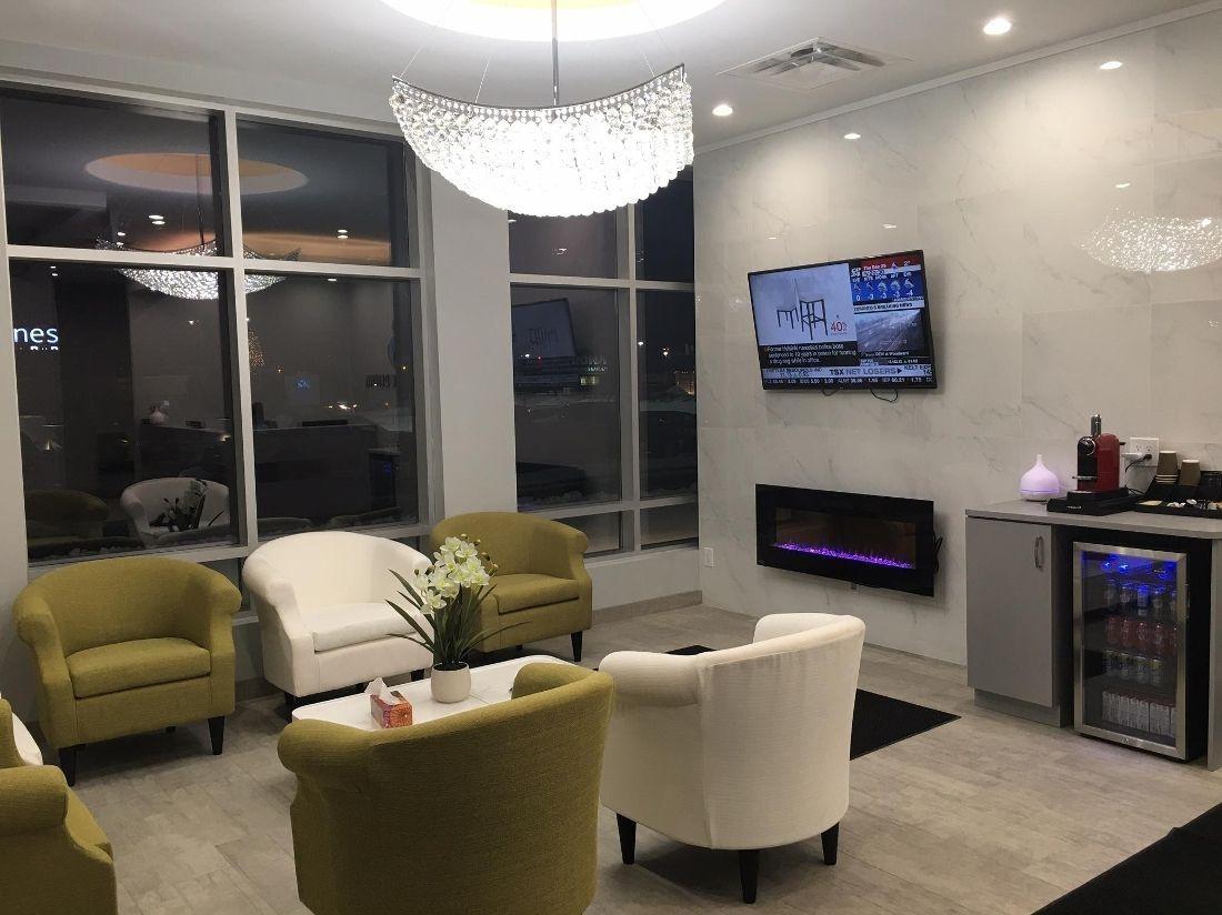 Comfortable waiting room with green chairs