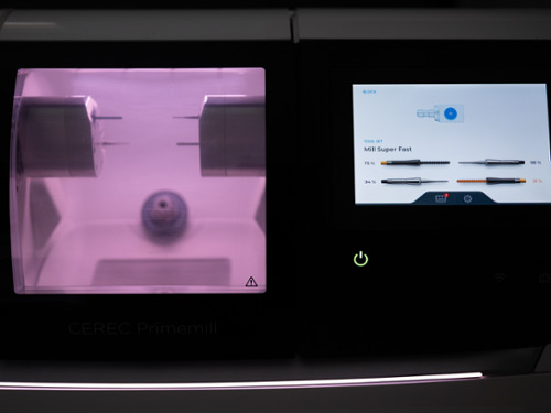 Advanced CEREC milling machine used at Park Place Dental to design and create custom porcelain crowns in a single visit.